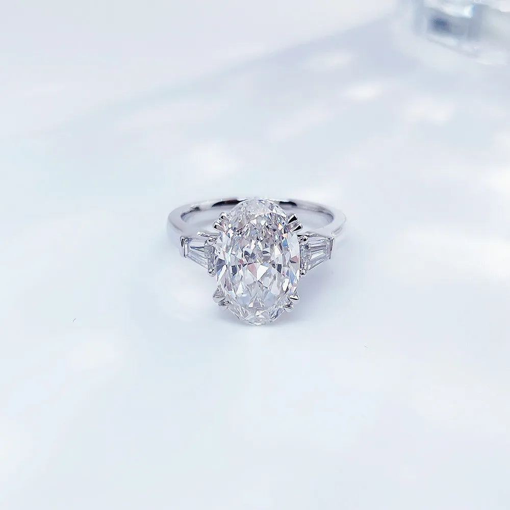 2.24 ct Four-Prong Oval-Cut Lab-Grown Diamond Three-Stone Ring in PT950 Platinum