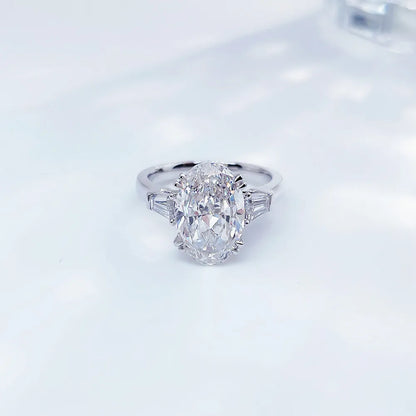 2.24 ct Four-Prong Oval-Cut Lab-Grown Diamond Three-Stone Ring in PT950 Platinum