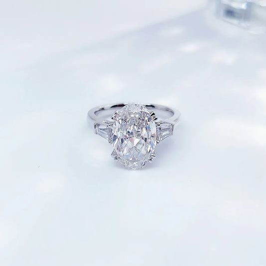 2.24 ct Four-Prong Oval-Cut Lab-Grown Diamond Three-Stone Ring in PT950 Platinum