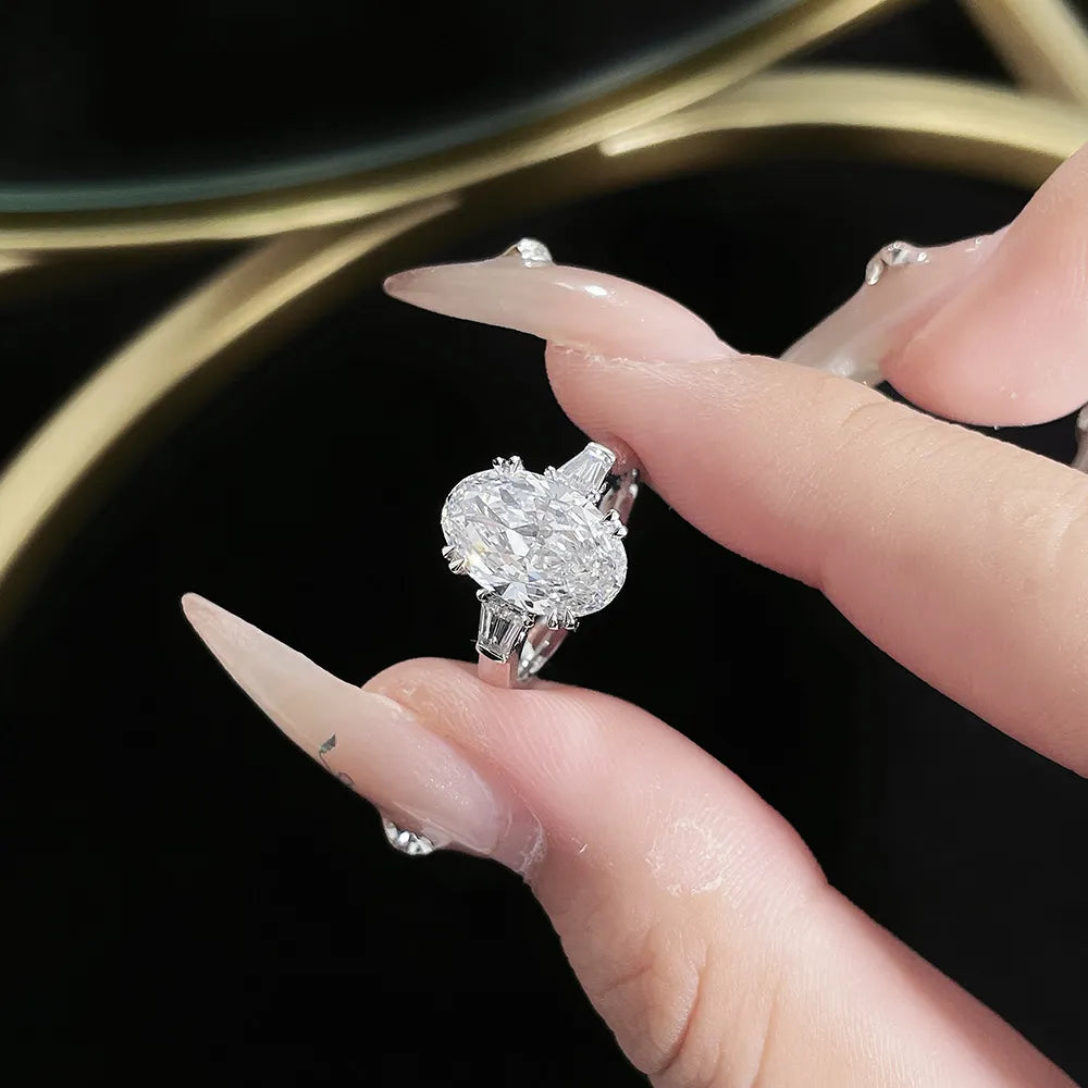 2.24 ct Four-Prong Oval-Cut Lab-Grown Diamond Three-Stone Ring in PT950 Platinum