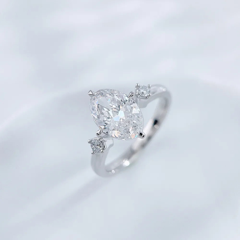 2.46 ct Celestial Four-Prong Oval-Cut Lab-Grown Diamond Three-Stone Ring in PT950 Platinum