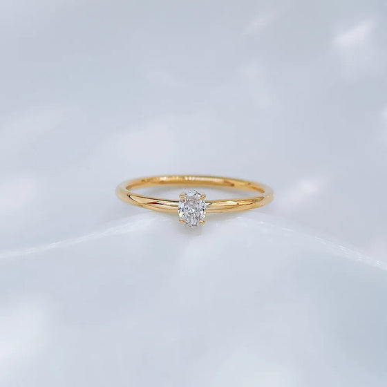 0.15 ct Celestial Four-Prong Oval-Cut Lab-Grown Diamond Ring in 18K Yellow Gold
