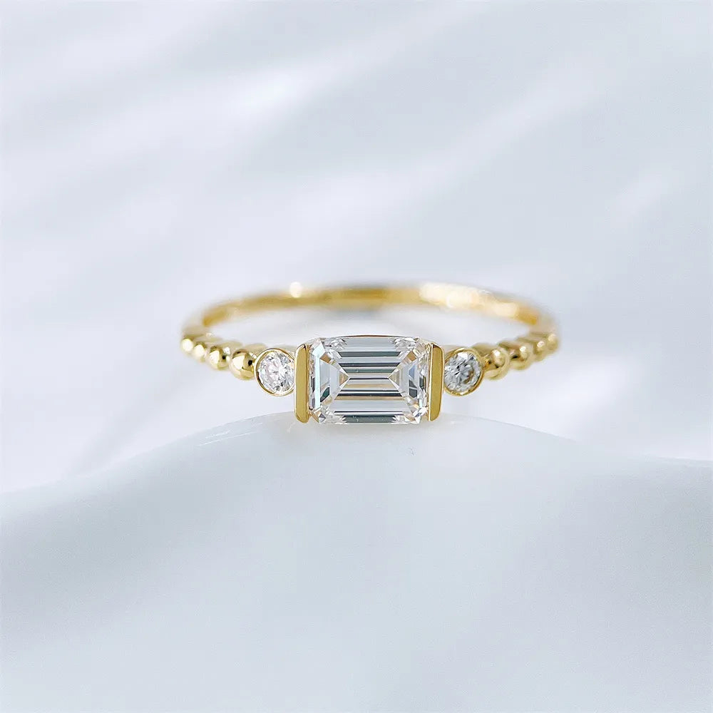 0.78 ct Emerald-Cut Lab-Grown Diamond Three-Stone Ring in 18K Yellow Gold