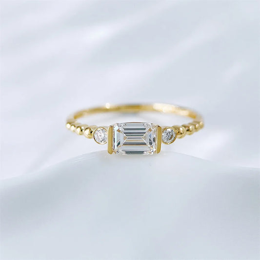 0.78 ct Emerald-Cut Lab-Grown Diamond Three-Stone Ring in 18K Yellow Gold