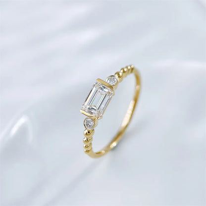 0.78 ct Emerald-Cut Lab-Grown Diamond Three-Stone Ring in 18K Yellow Gold