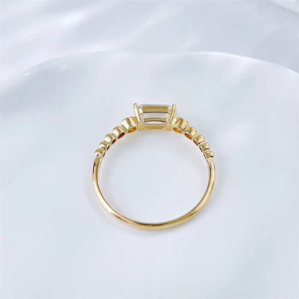 0.78 ct Emerald-Cut Lab-Grown Diamond Three-Stone Ring in 18K Yellow Gold