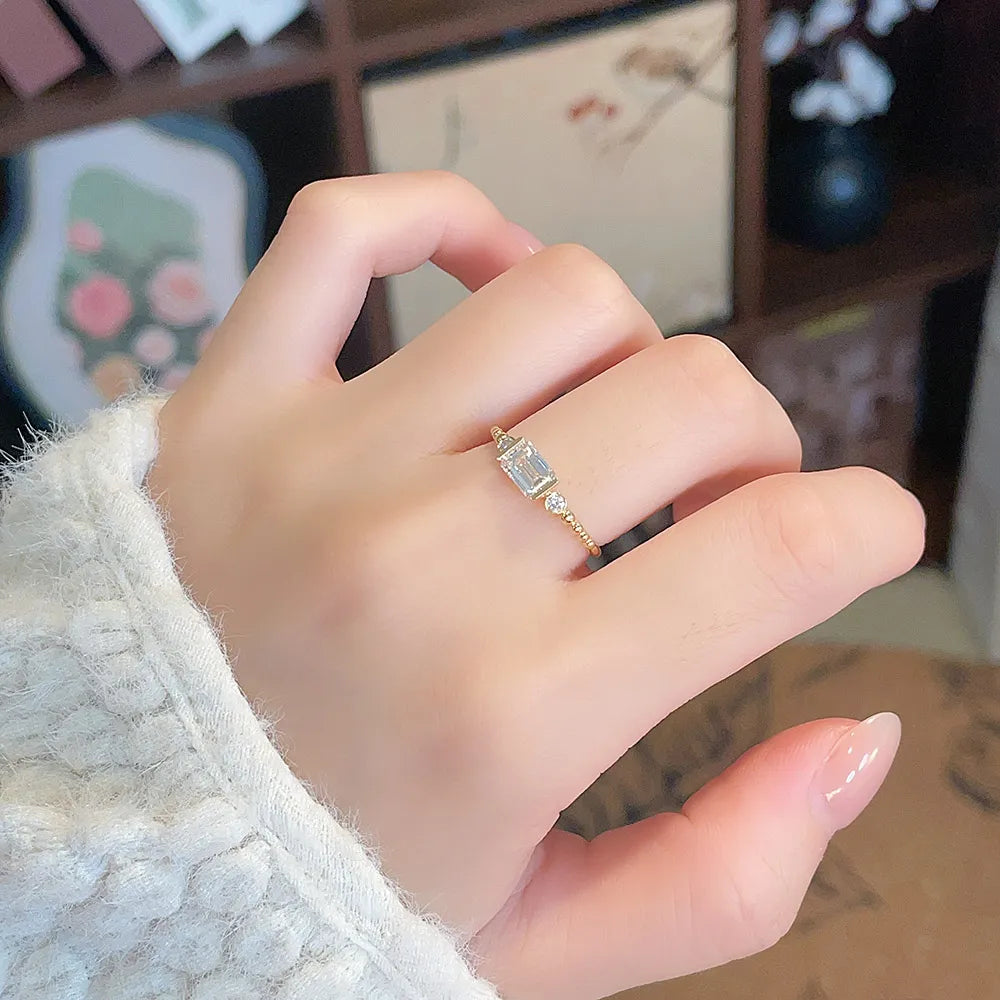 0.78 ct Emerald-Cut Lab-Grown Diamond Three-Stone Ring in 18K Yellow Gold