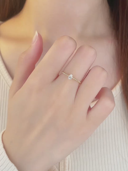 0.15 ct Minimalist Three-Prong Pear-Cut Lab-Grown Diamond Ring in 18K Yellow Gold video