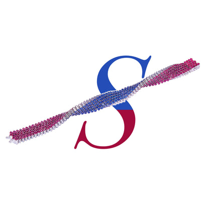 The Reversible Classic reversible ruby and sapphire bracelet laid diagonally